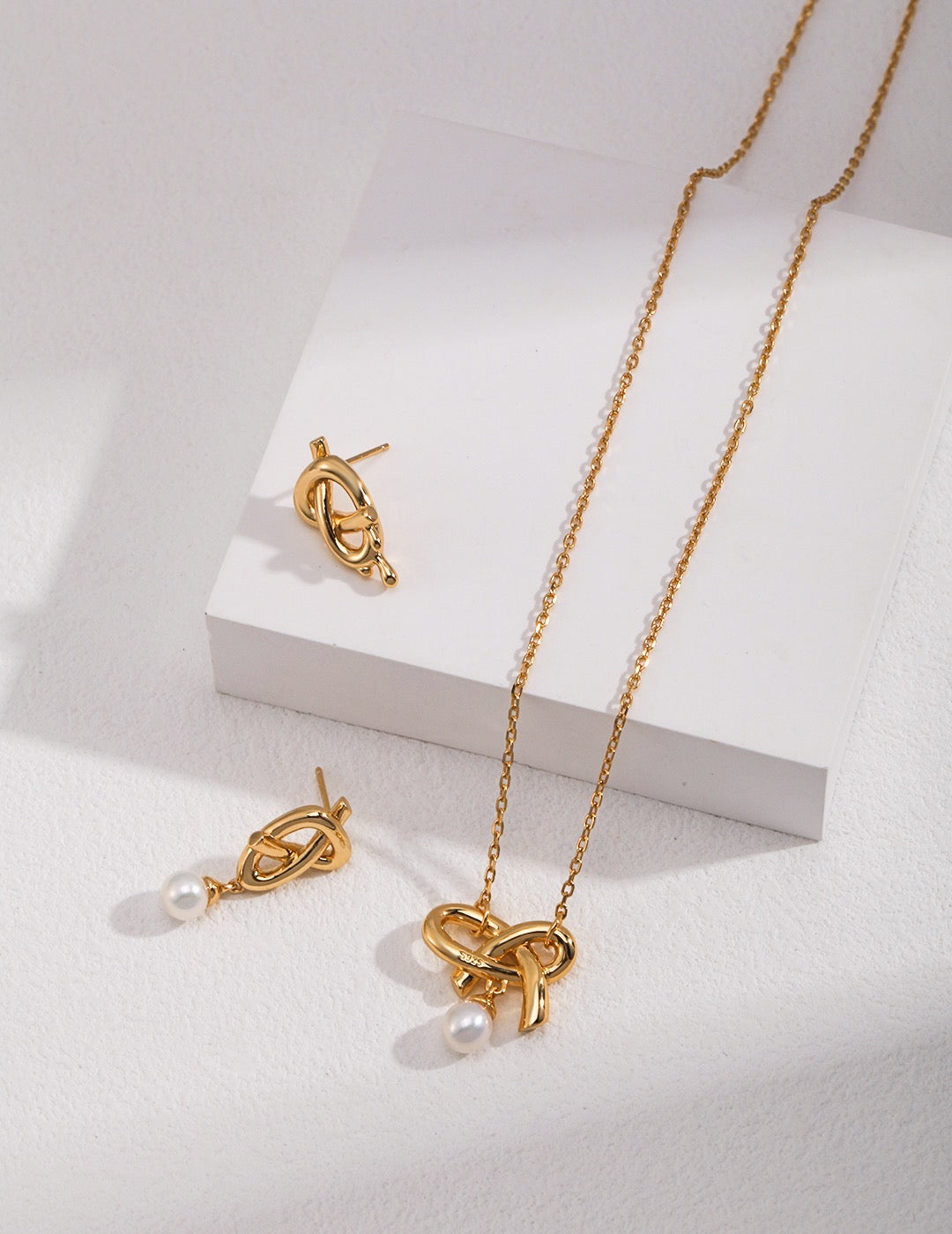 Boucles d'oreilles en forme de nœud en forme de cœur