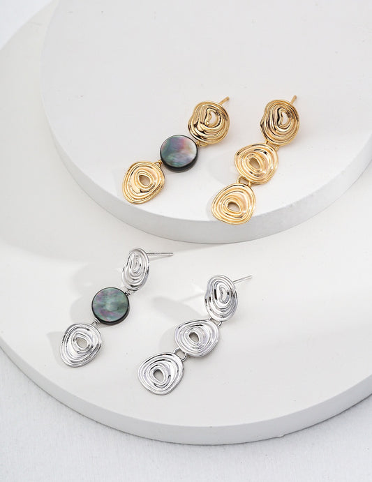 Boucles d'oreilles asymétriques en nacre