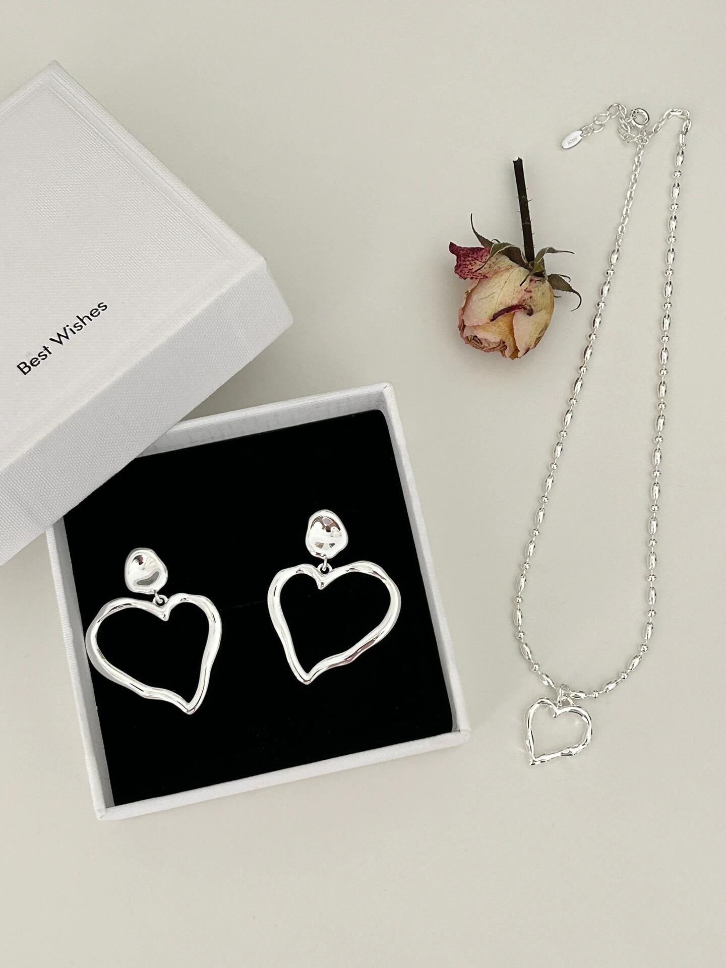 Boucles d'oreilles en argent méga coeur creux