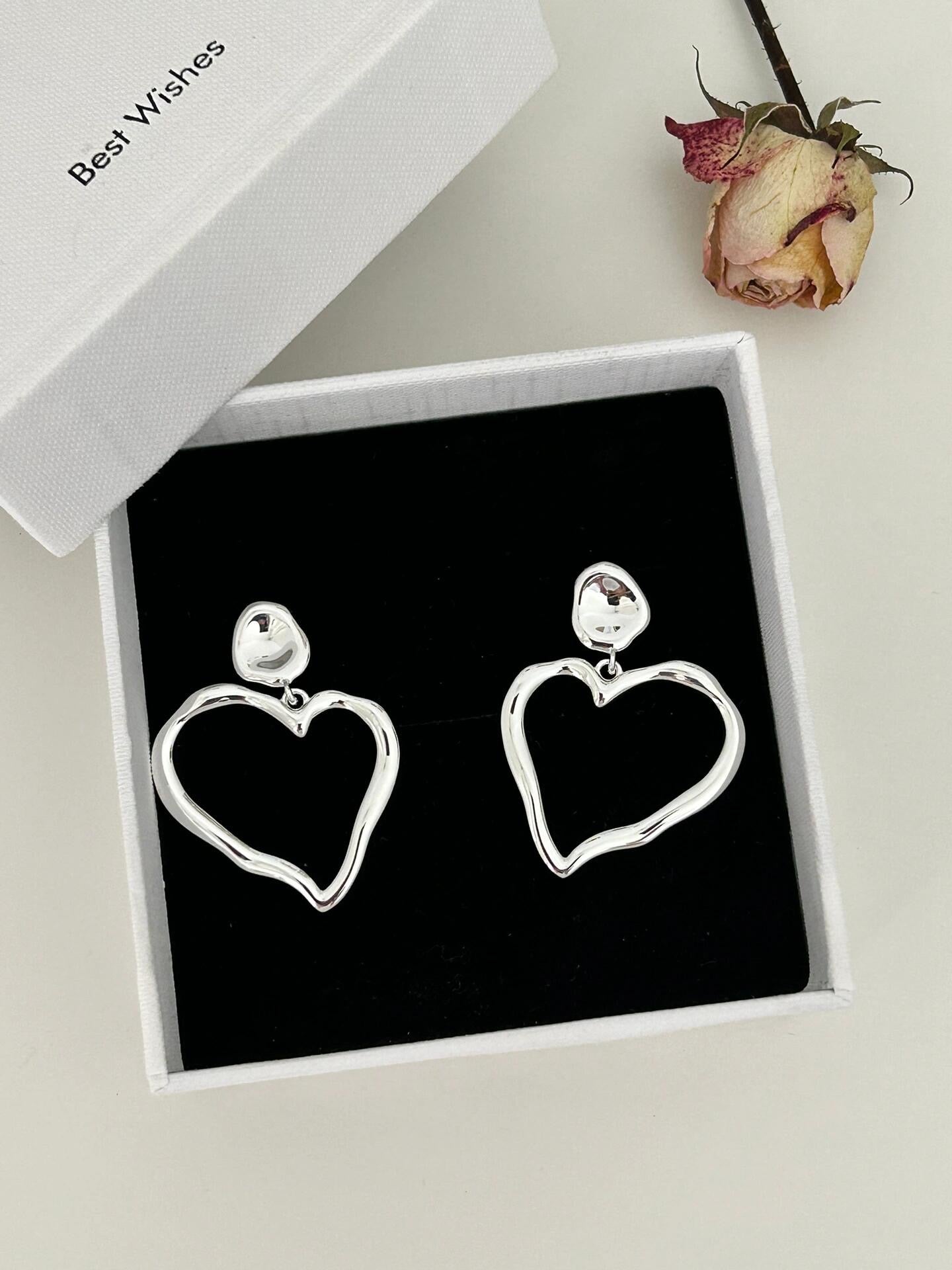 Boucles d'oreilles en argent méga coeur creux