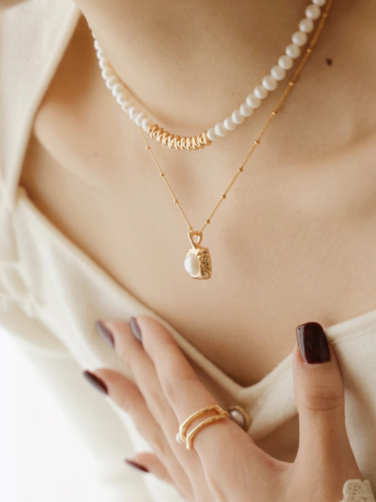 Pearl in the Palm Necklace