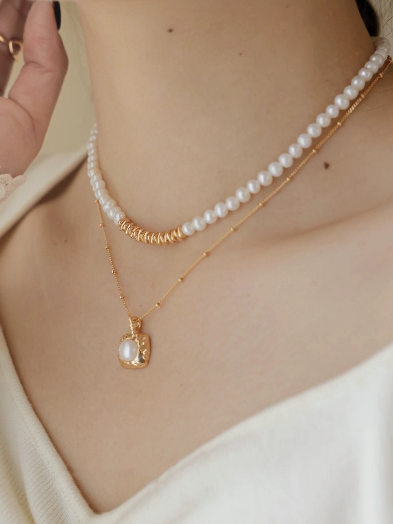 Pearl in the Palm Necklace