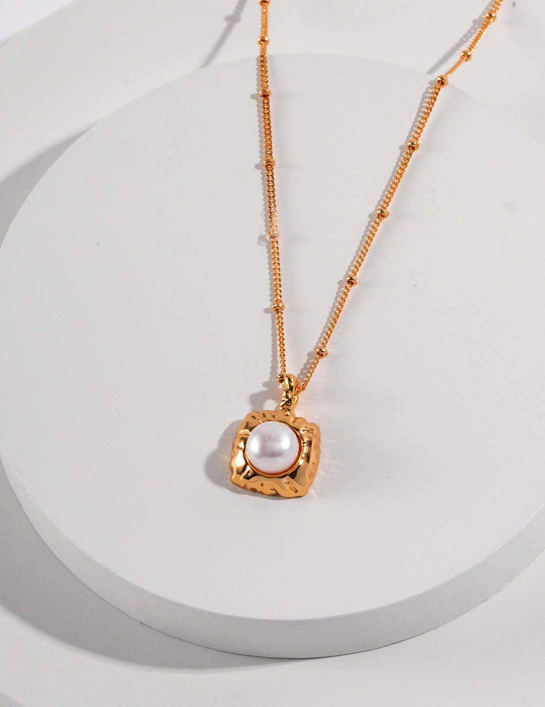 Pearl in the Palm Necklace