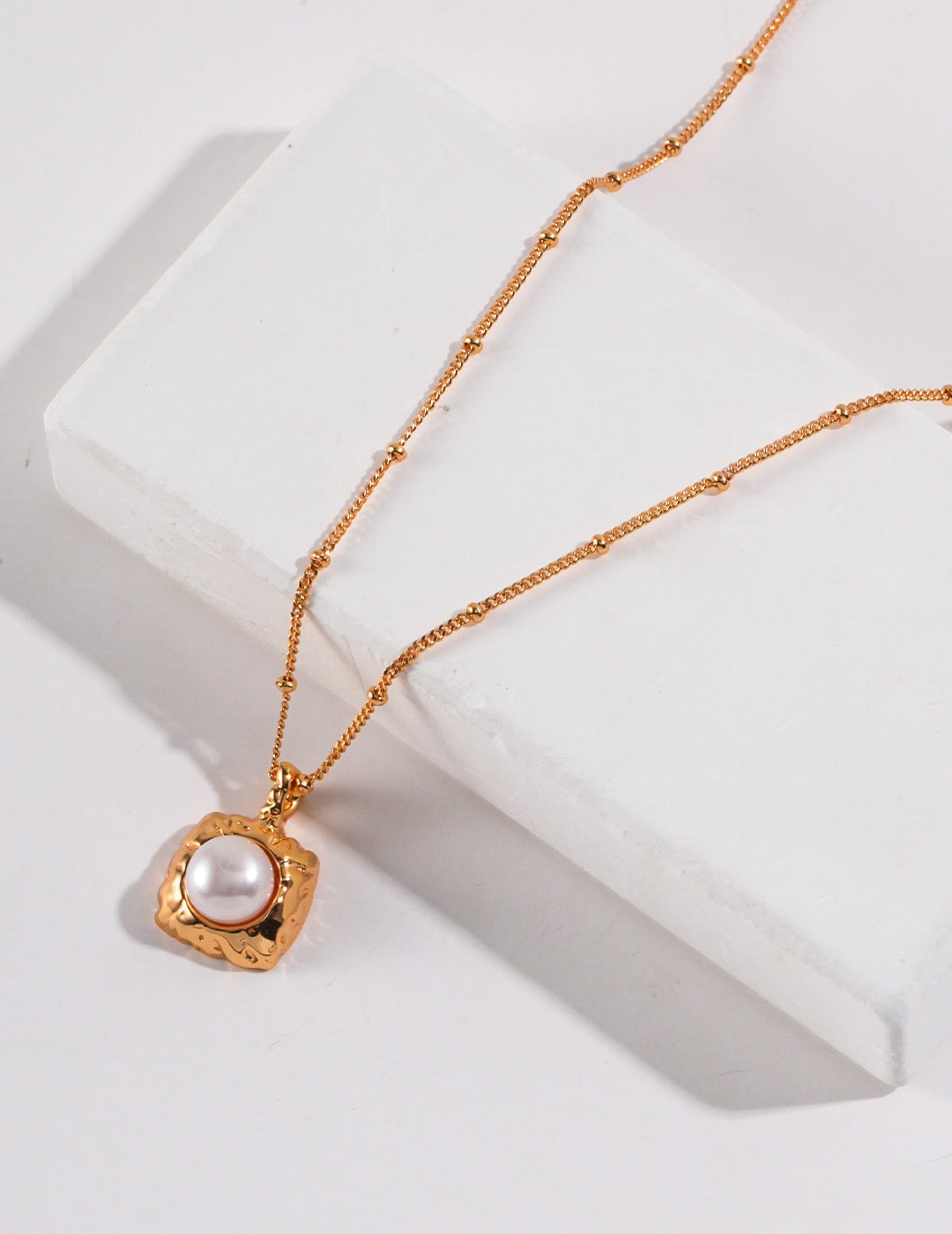 Pearl in the Palm Necklace